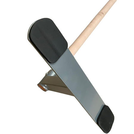 Underside of handstand bar showing anti-slip rubber pads for floor grip and stability