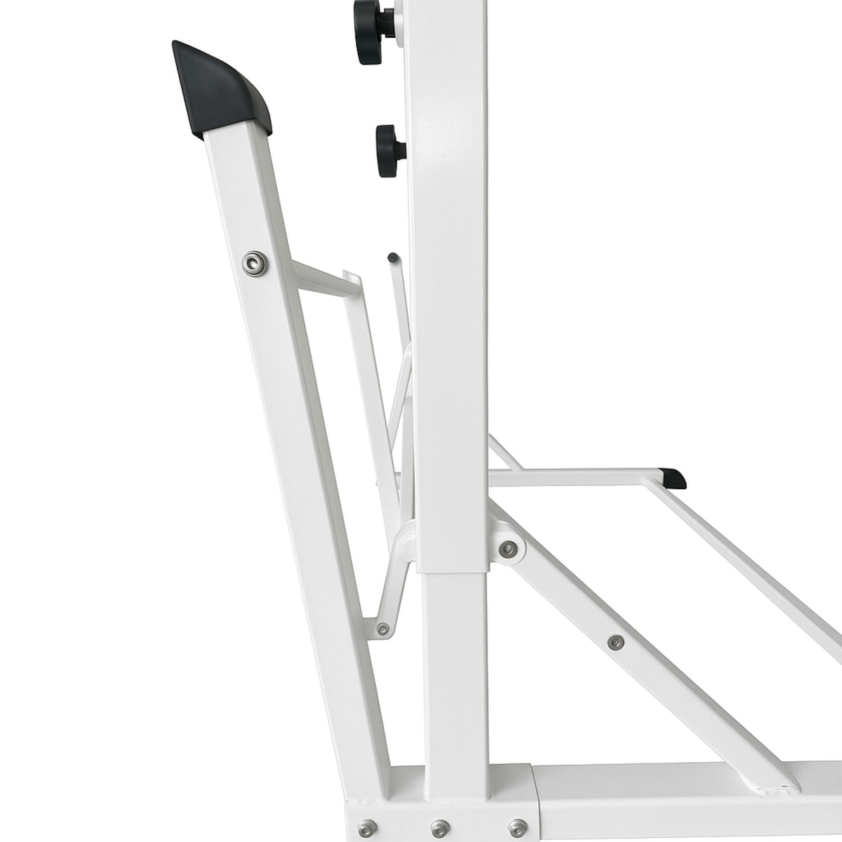 White adjustable gymnastics bar set up indoors for home practice – Cannons UK.