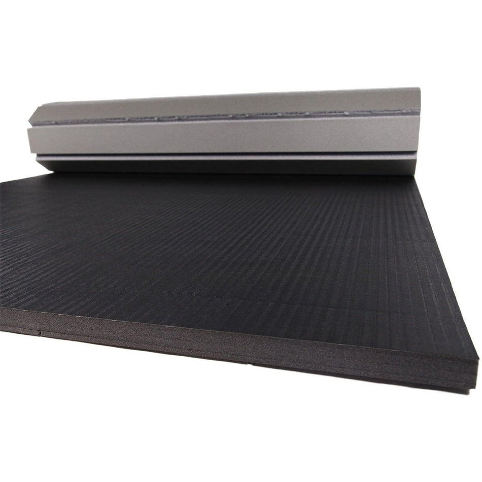 12m rollaway mat vinyl top in black — close view of rolled edge and ribbed surface for grip; great for MMA and dojo use