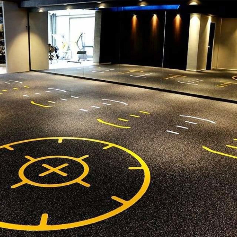 Smirna 8mm rubber roll installed with round target marking — durable, low-slip surface for circuits and agility drills