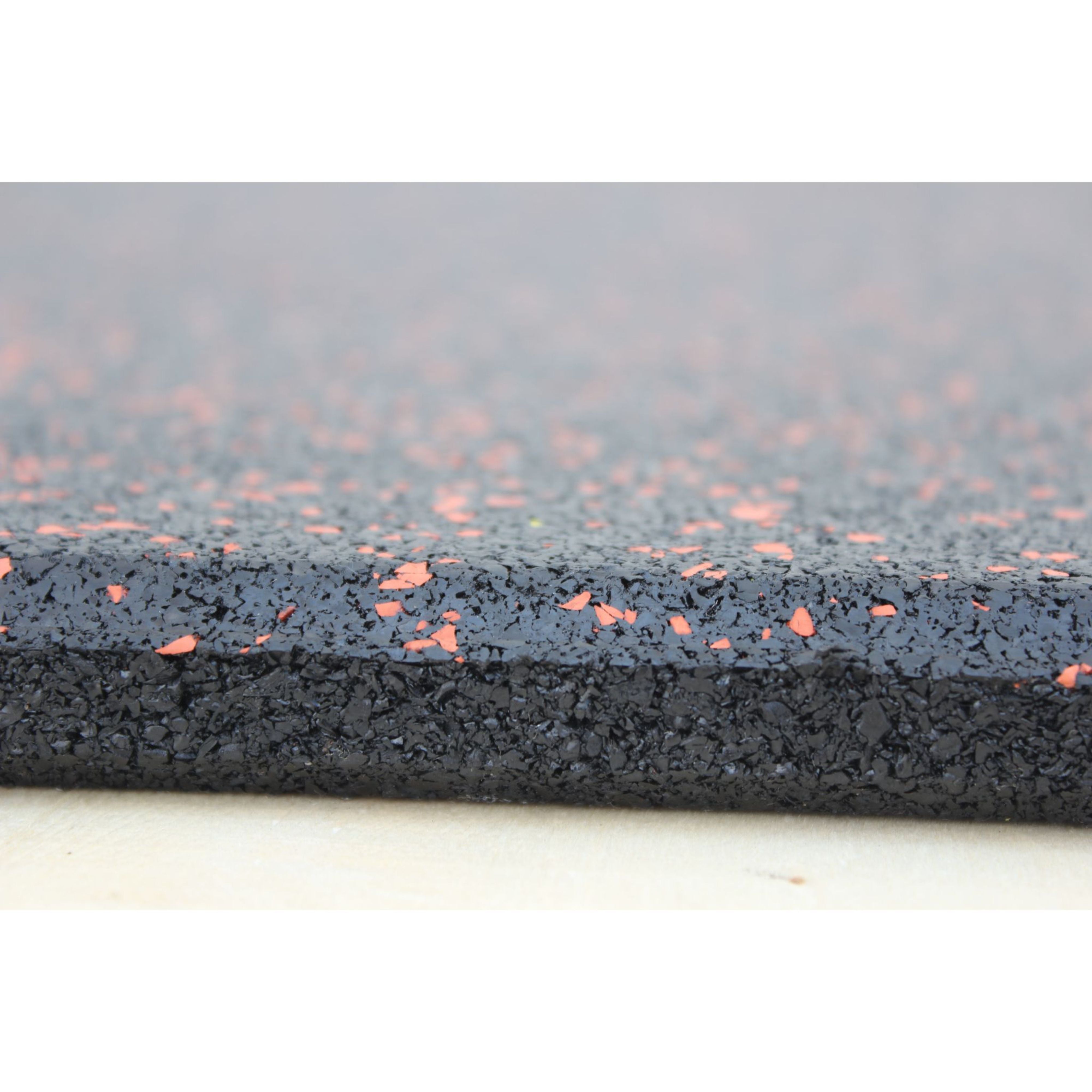 Red fleck tile showing both edge thickness and speckled top