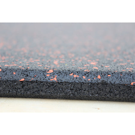 Red fleck tile showing both edge thickness and speckled top