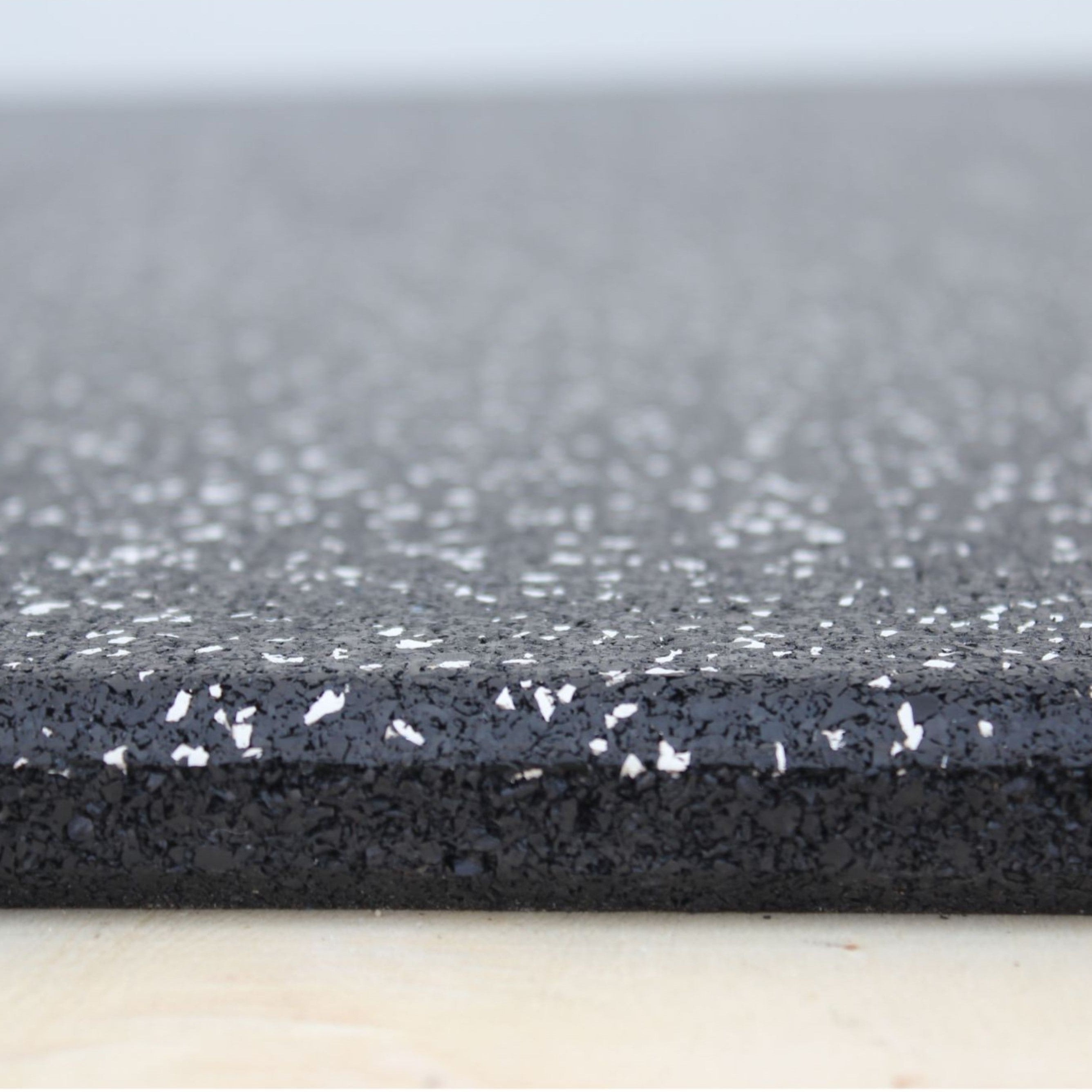 Edge angle of white fleck tile – fine cut and texture