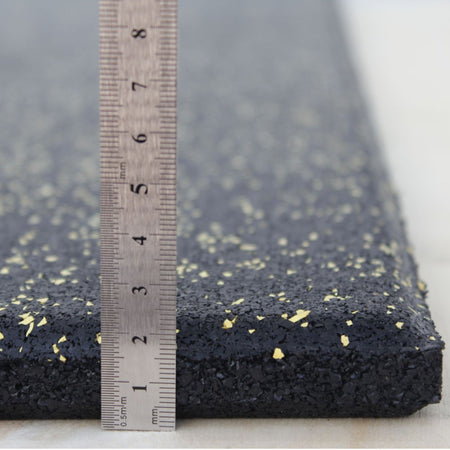 Yellow fleck rubber tile thickness shown from side