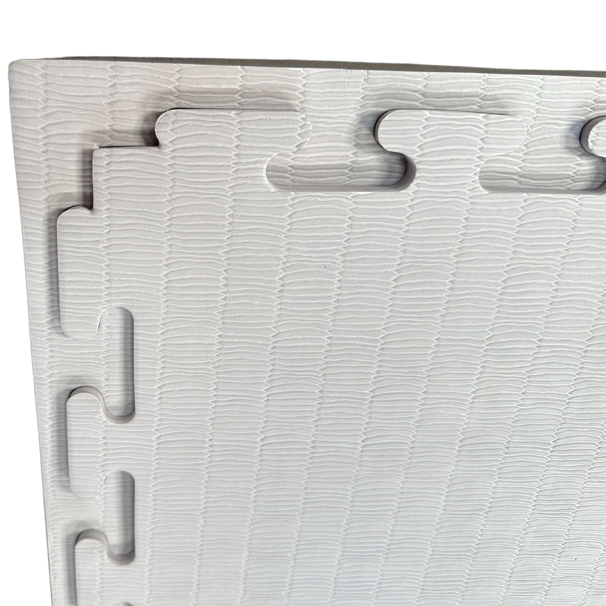 Close-up of interlocking edges on 40 mm tatami MMA mats
