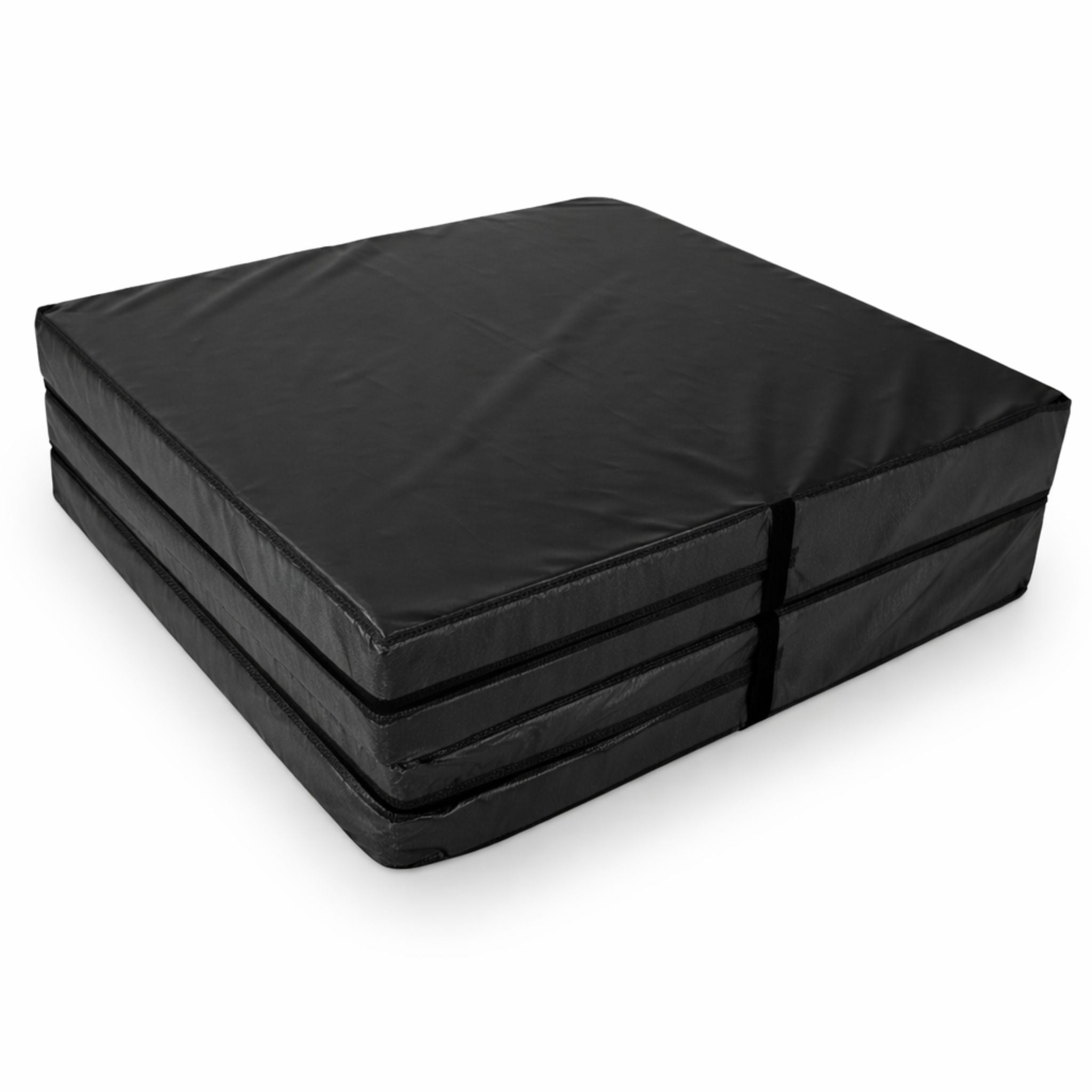 Black folding gymnastics crash mat folded for storage, heavy-duty vinyl cover and Velcro straps, Cannons UK
