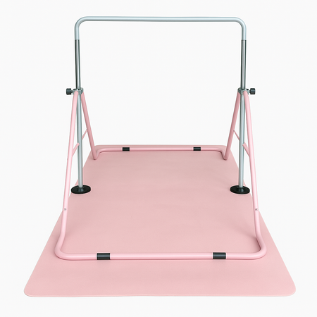 Close-up front view of the Cannons UK gymnastics bar with pink mat. Displays smooth surface mat and stable bar connection for children’s training.