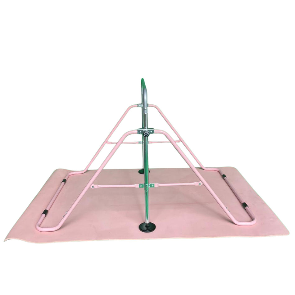 Side angle of the Cannons UK junior gymnastics bar with pink mat. Shows frame structure, bar support, and non-slip base for safe practice.