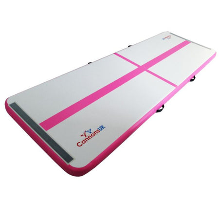 Air Track Pro 4m × 1m × 10cm pink — isometric hero showing end Velcro connector, grey deck and pink rails; portable inflatable mat for PE, cheer and gymnastics practice