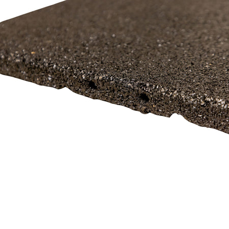 Side profile of black 20 mm tile — thickness and straight edge visible