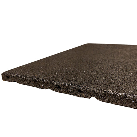 Black rubber tile 20 mm — edge detail showing dense compound and neat cut