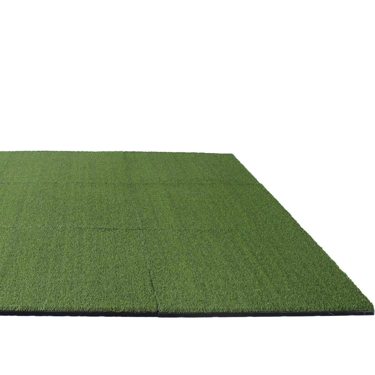 Angled studio image of full 36m² grass-topped rubber tile  
