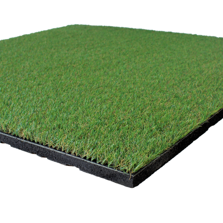 Side profile of grass-topped rubber garden tile showing thickness  
