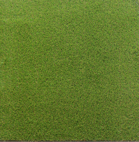 Artificial grass-topped rubber floor tile – top-down product view  

