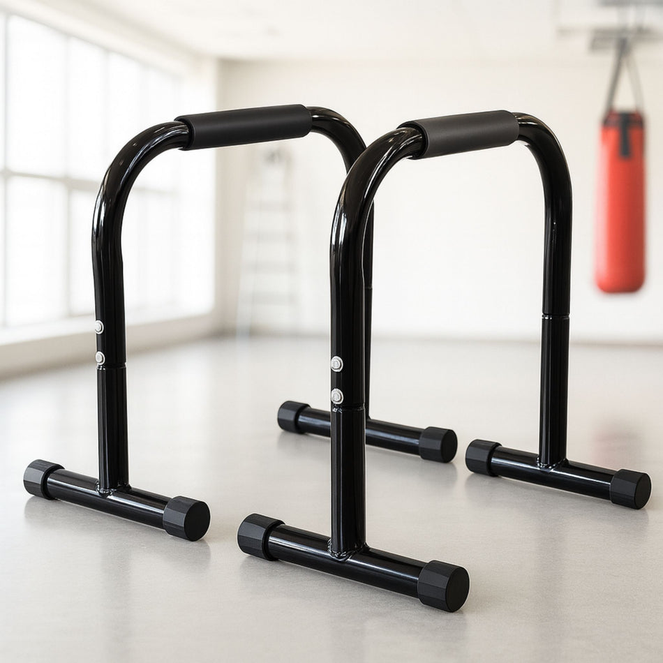 Side view of black high parallel bars on a clean white background.