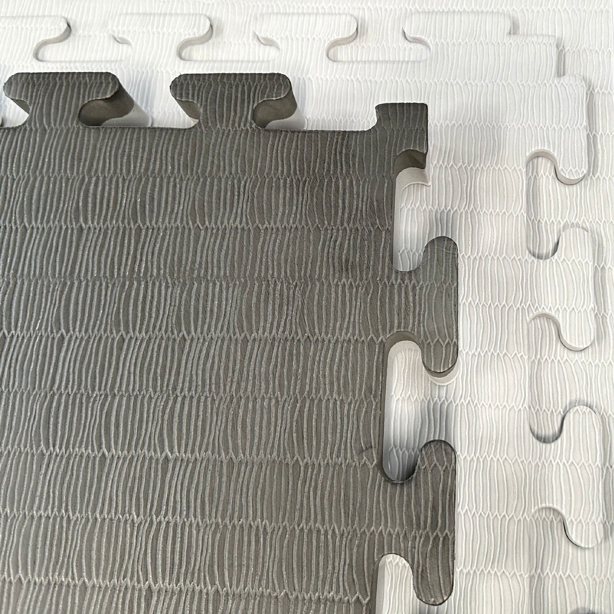 40mm tatami grey and black reversible jigsaw mat sample – white background  
