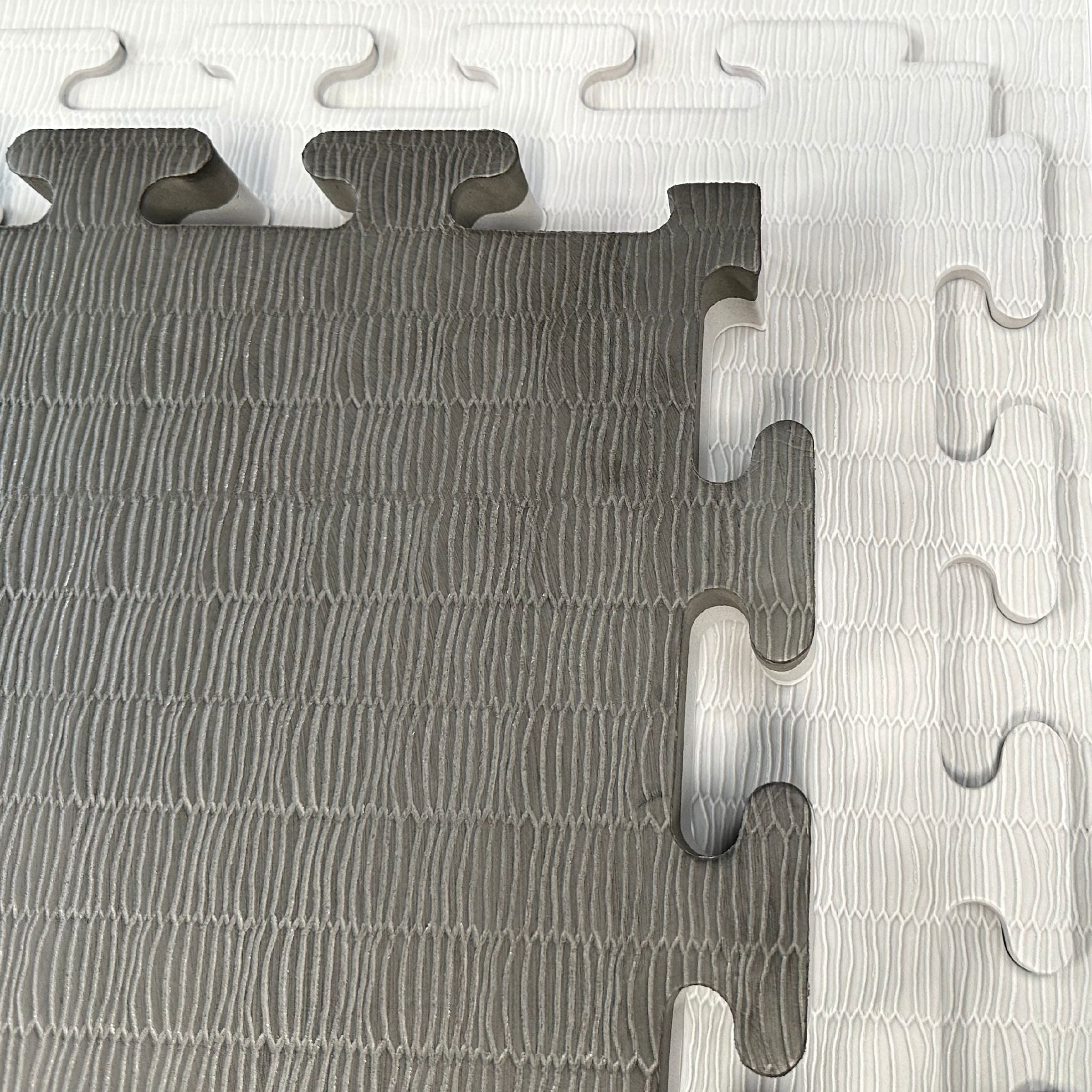 40mm tatami grey and black reversible jigsaw mat sample – white background  
