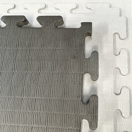 40mm tatami grey and black reversible jigsaw mat sample – white background  
