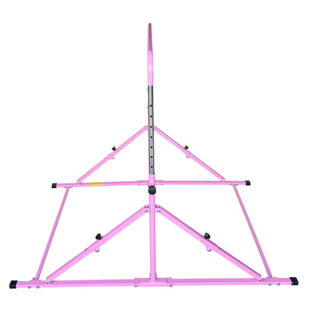 Folded pink Junior Pro bar leaning against wall	
