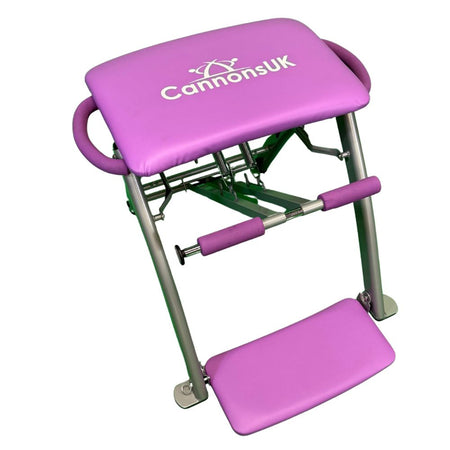 Side view of purple Pilates chair with robust steel frame construction