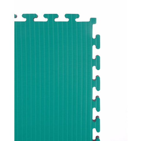 Stack of red and green reversible 40 mm tatami jigsaw mats, front view showing dual colours and interlocking edges.