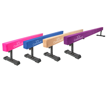 Full Cannons UK 8ft solid gymnastic beams in tan, pink, purple, and blue shown from alternate angle for comparison.