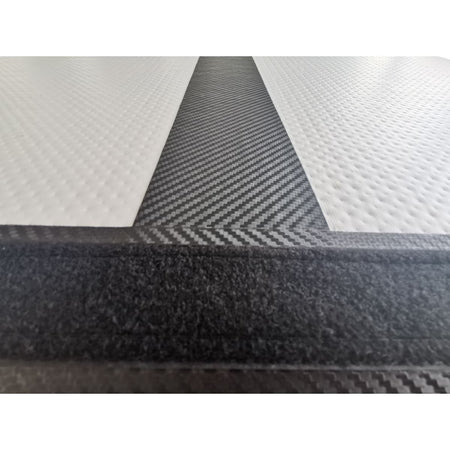 Air Track Pro 3×1×10cm — black (carbon pattern) macro surface/texture close-up on white for material detail