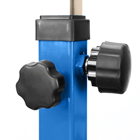 Blue height-adjustment knob close-up — turn-to-lock mechanism for safe home practice