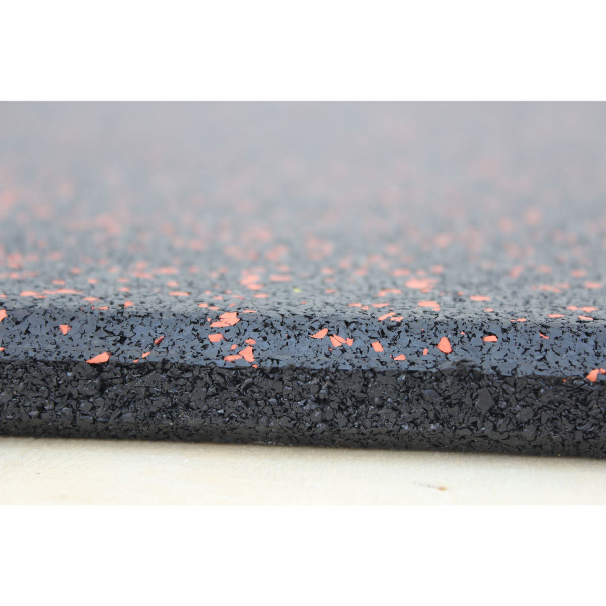 Red fleck tile close-up – surface and cut detail  
