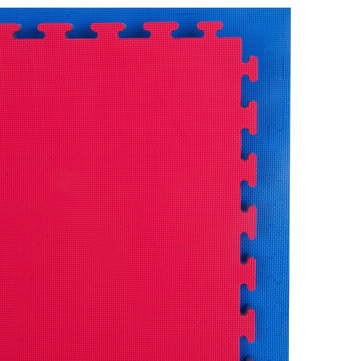 Macro texture close-up of reversible mat surface, showing jigsaw pattern and robust foam edge.